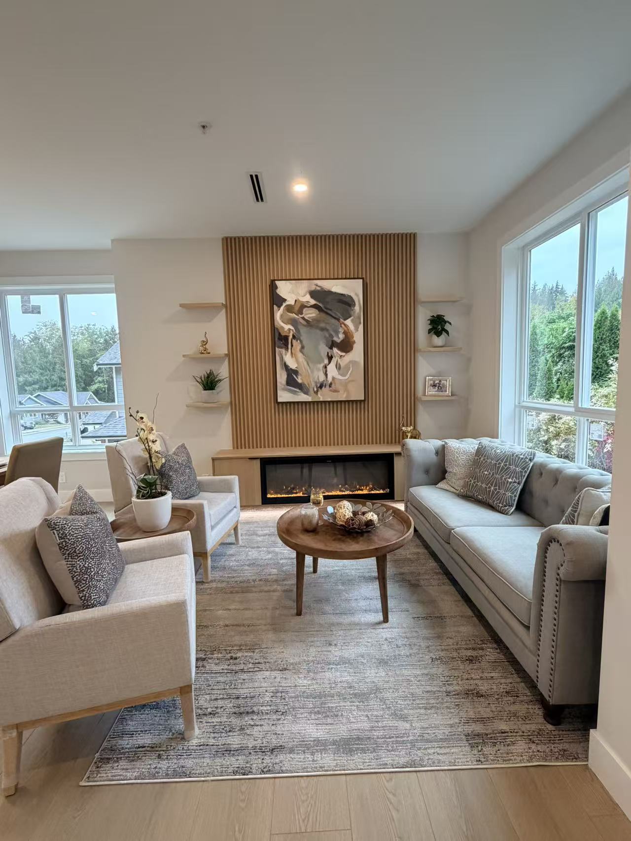 Custom architectural millwork fireplace feature wall with vertical wood slats and floating shelves
